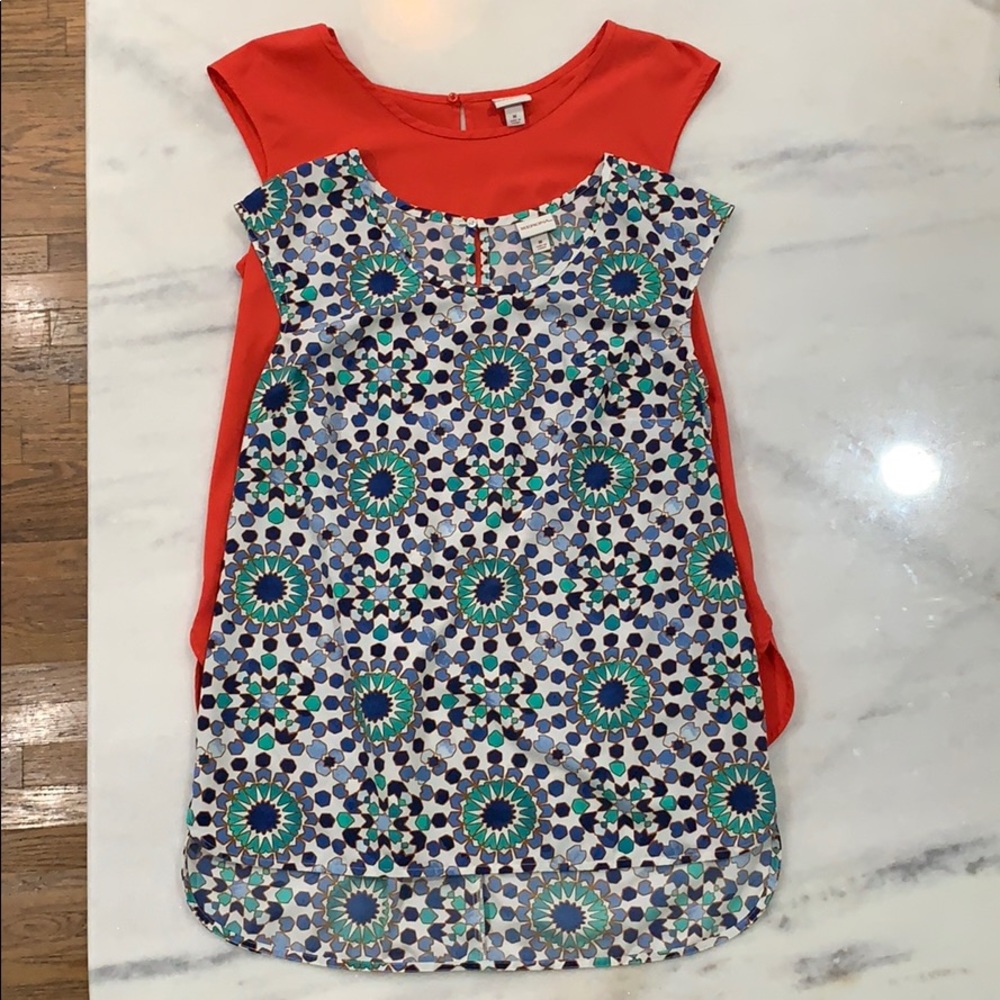 Two short sleeve red & blue patterned shirts